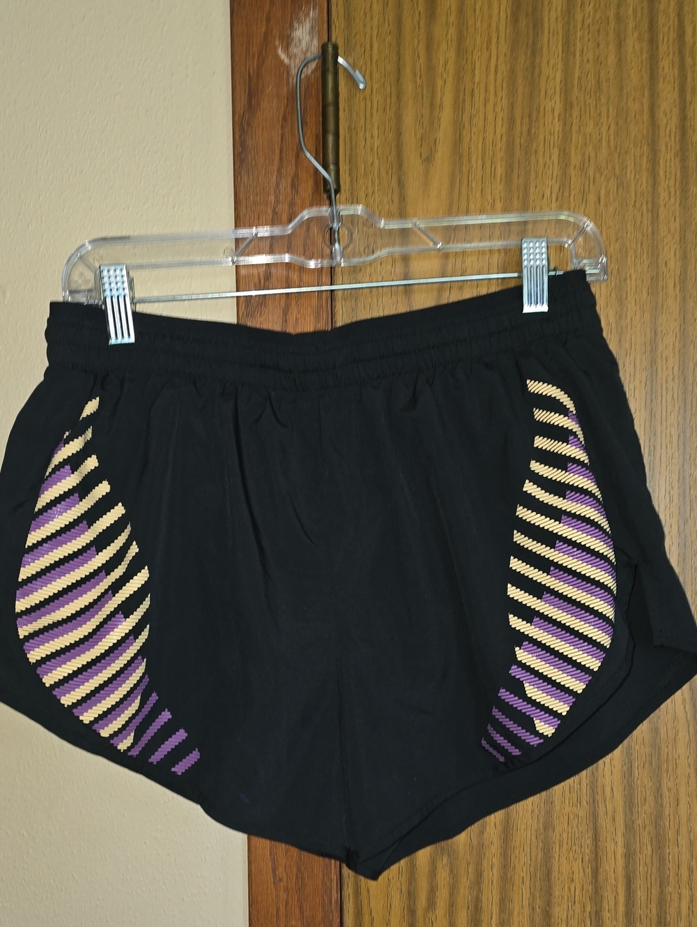Nike Black Women's Athletic Shorts with Purple & Gold Stripes